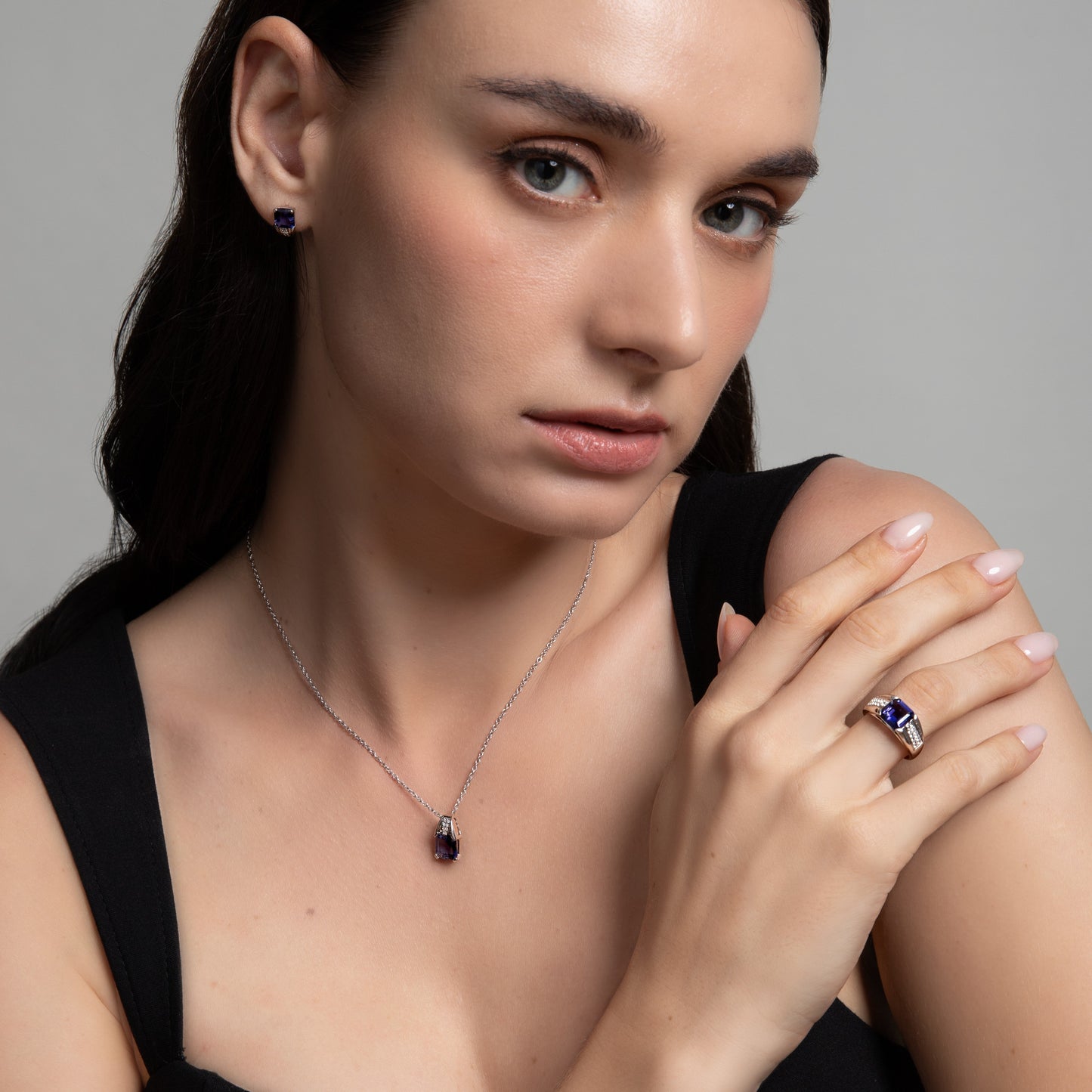 Le Petite Folie: Iolite Emerald Cut 4-Prong Pendant Necklace with White Topaz Accents in Rhodium Plated 925 Silver