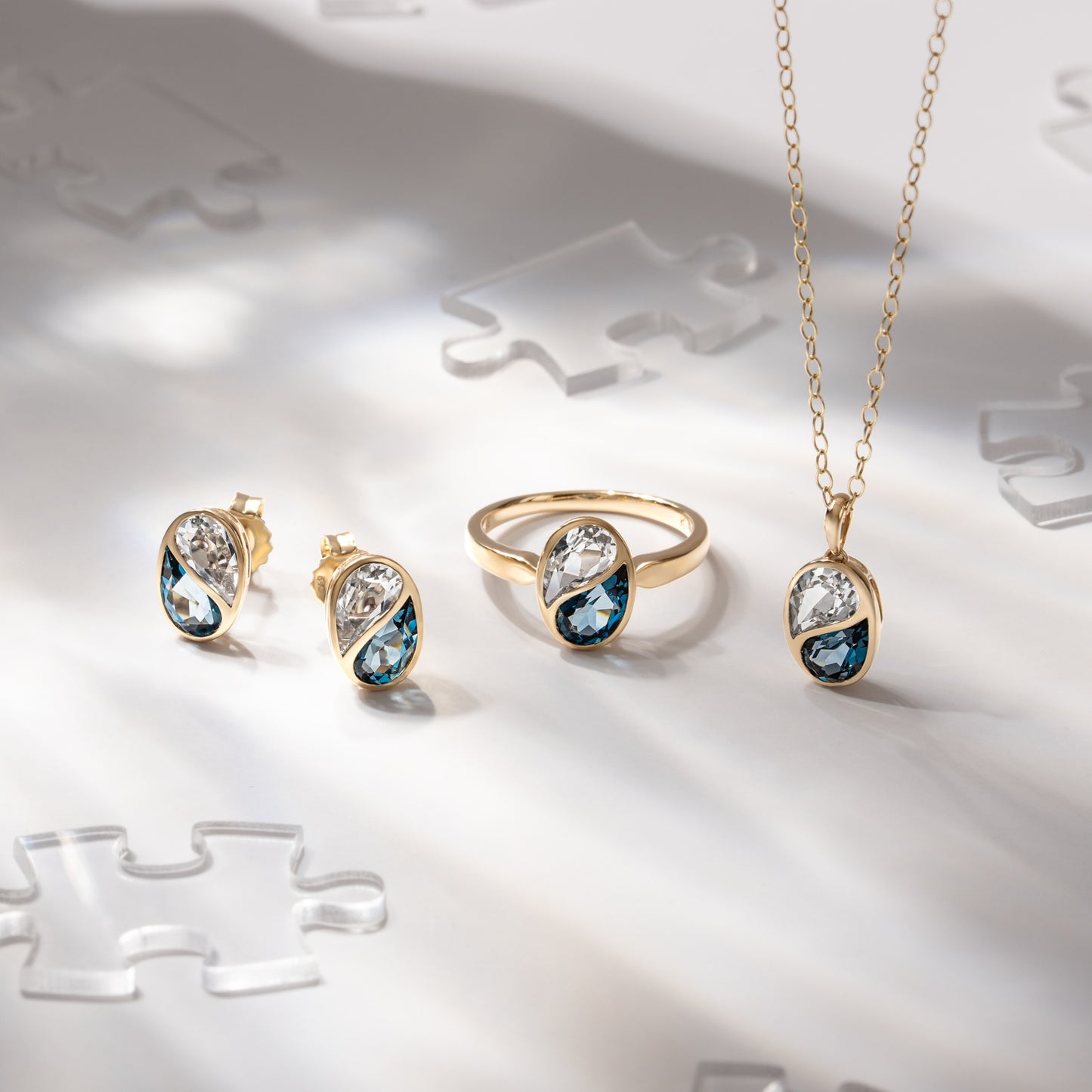 Puzzle: London Blue and White Topaz Special Cut Bezel Set Stud Earring in 18K Yellow Gold