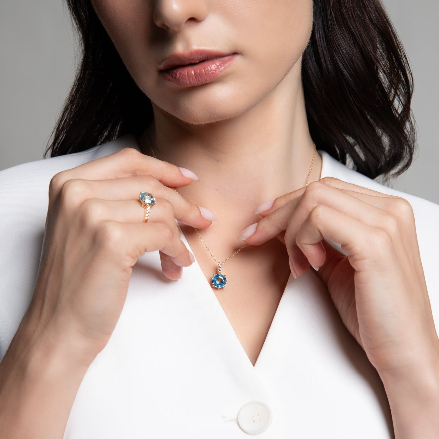 Novalty: Light Blue Topaz Hexagon Cut 4-Prong Pendant with White Topaz in 18K Yellow Gold