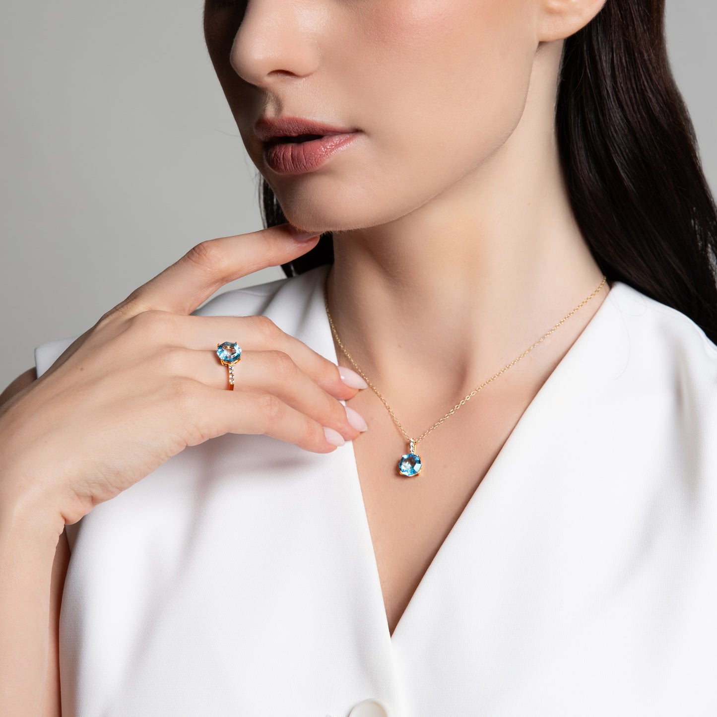 Novalty: Light Blue Topaz Hexagon Cut 4-Prong Pendant with White Topaz in 18K Yellow Gold