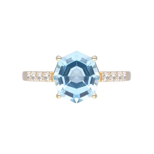 Novalty: Light Blue Topaz Round Cut 4-Prong Solitaire Ring with White Topaz Shoulders in 18K Yellow Gold