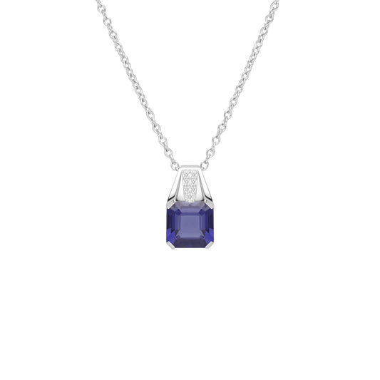 Le Petite Folie: Iolite Emerald Cut 4-Prong Pendant Necklace with White Topaz Accents in Rhodium Plated 925 Silver