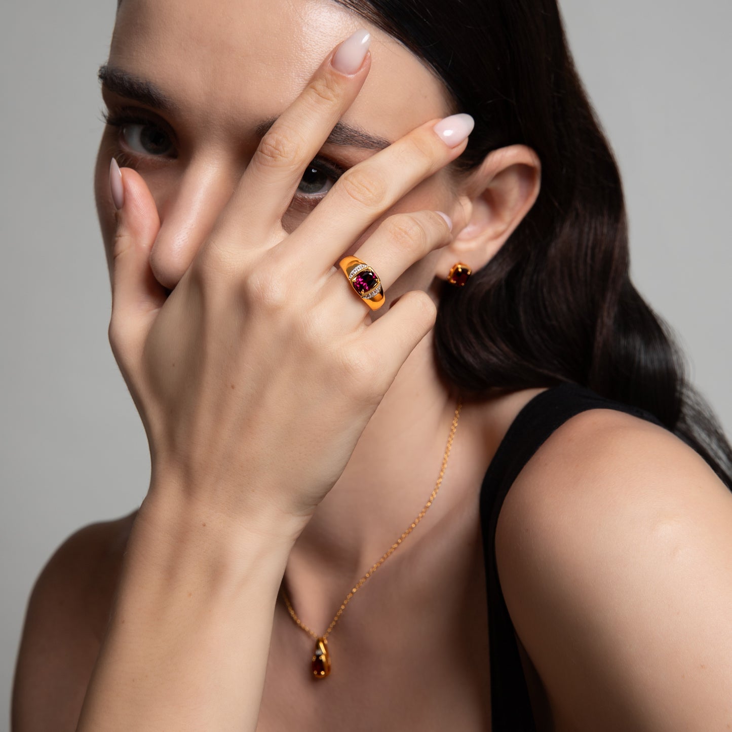 Le Petite Folie: Rhodolite Garnet Oval Cut 4-Prong with White Topaz Accent Band Ring in Gold Plated 925 Sterling Silver
