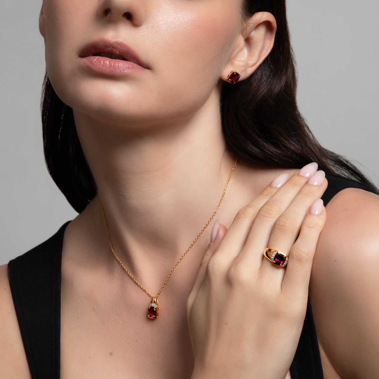 Le Petite Folie: Rhodolite Garnet Oval Cut 4-Prong Stud Earrings in Gold Plated 925 Sterling Silver